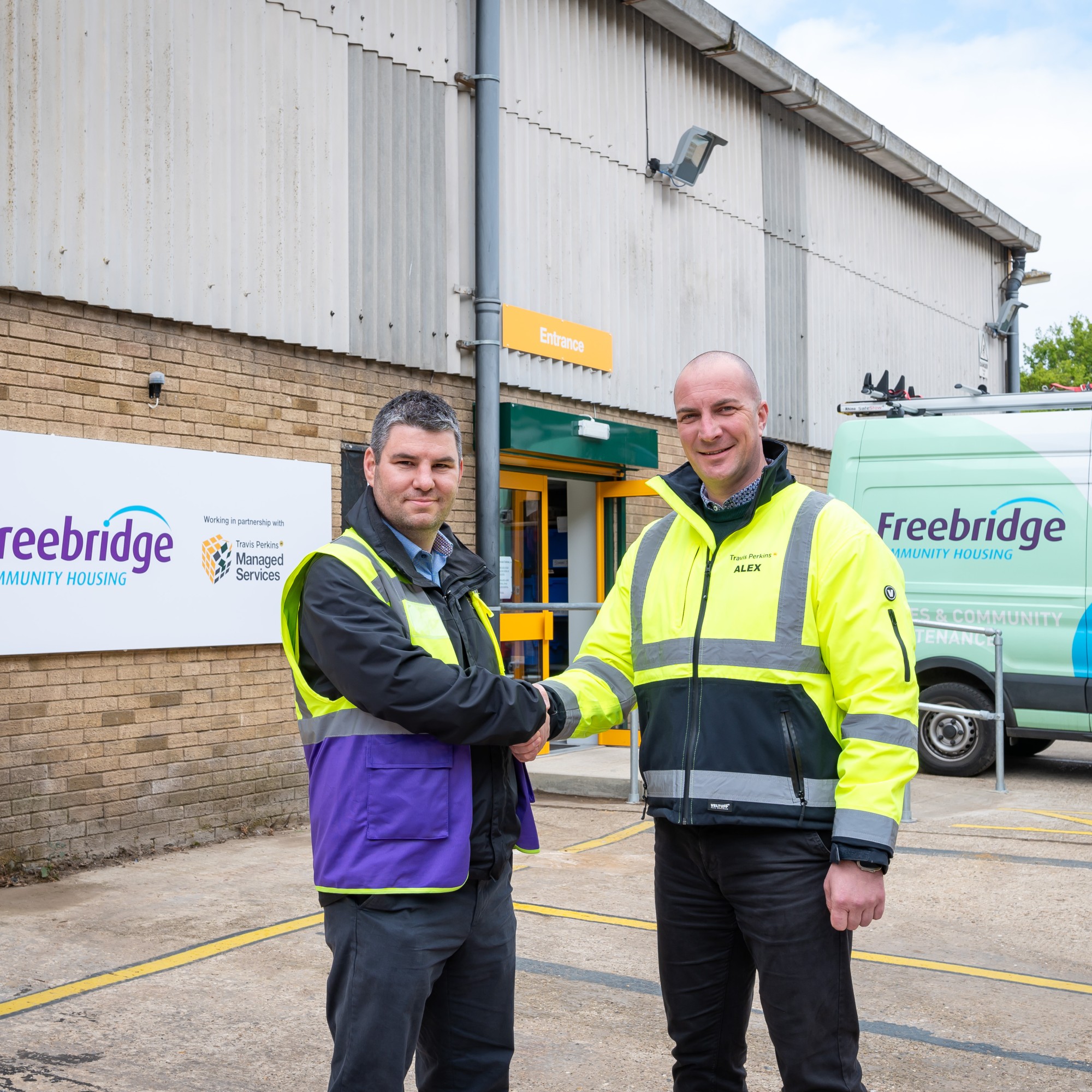 Freebridge and Travis Perkins shake on their new partnership. Photo by Paul Tibbs Photography